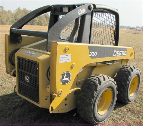 john deere 320 skid steer hydraulic oil capacity|john deere 320 loader specs.